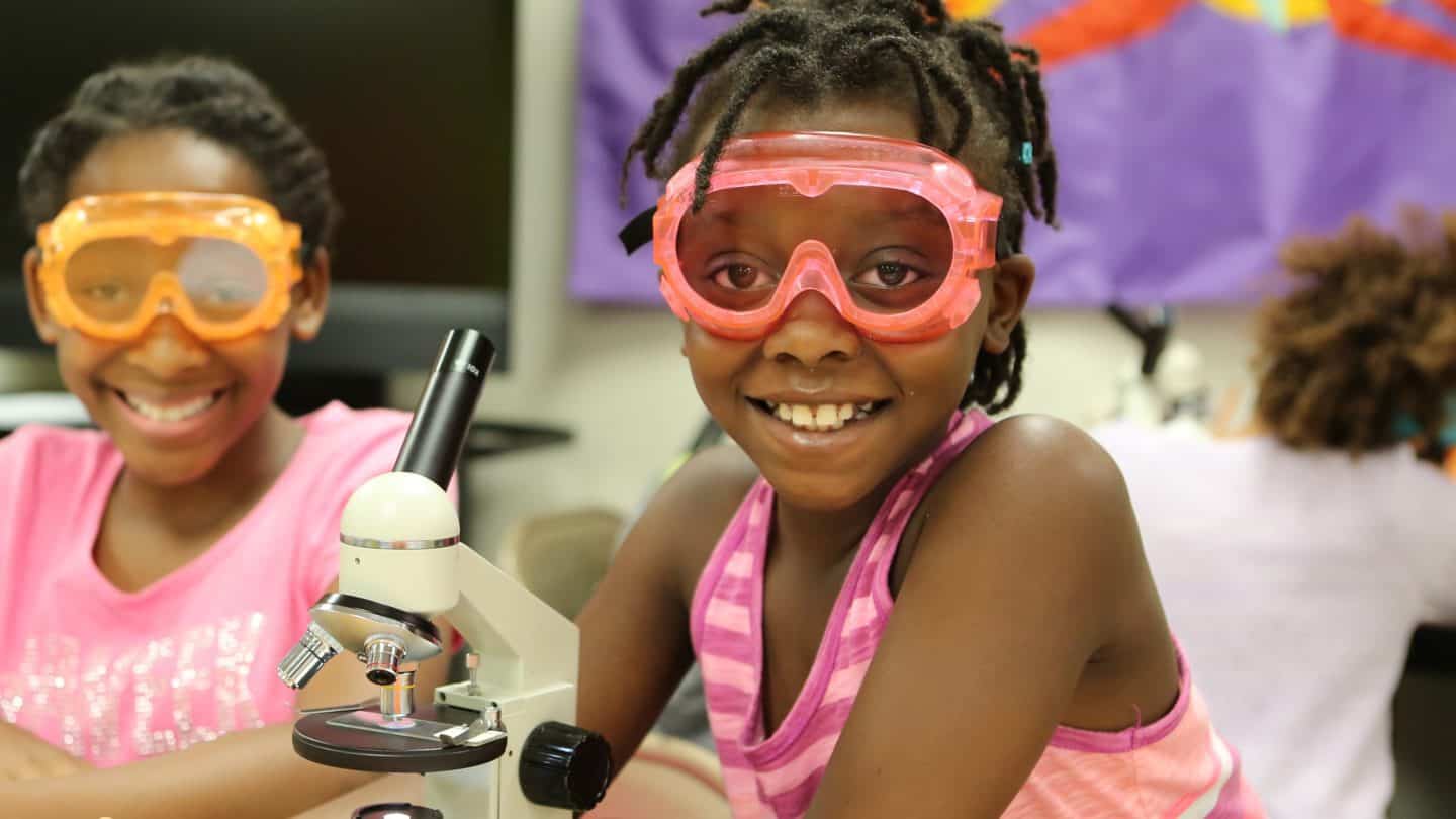 Students with microscope